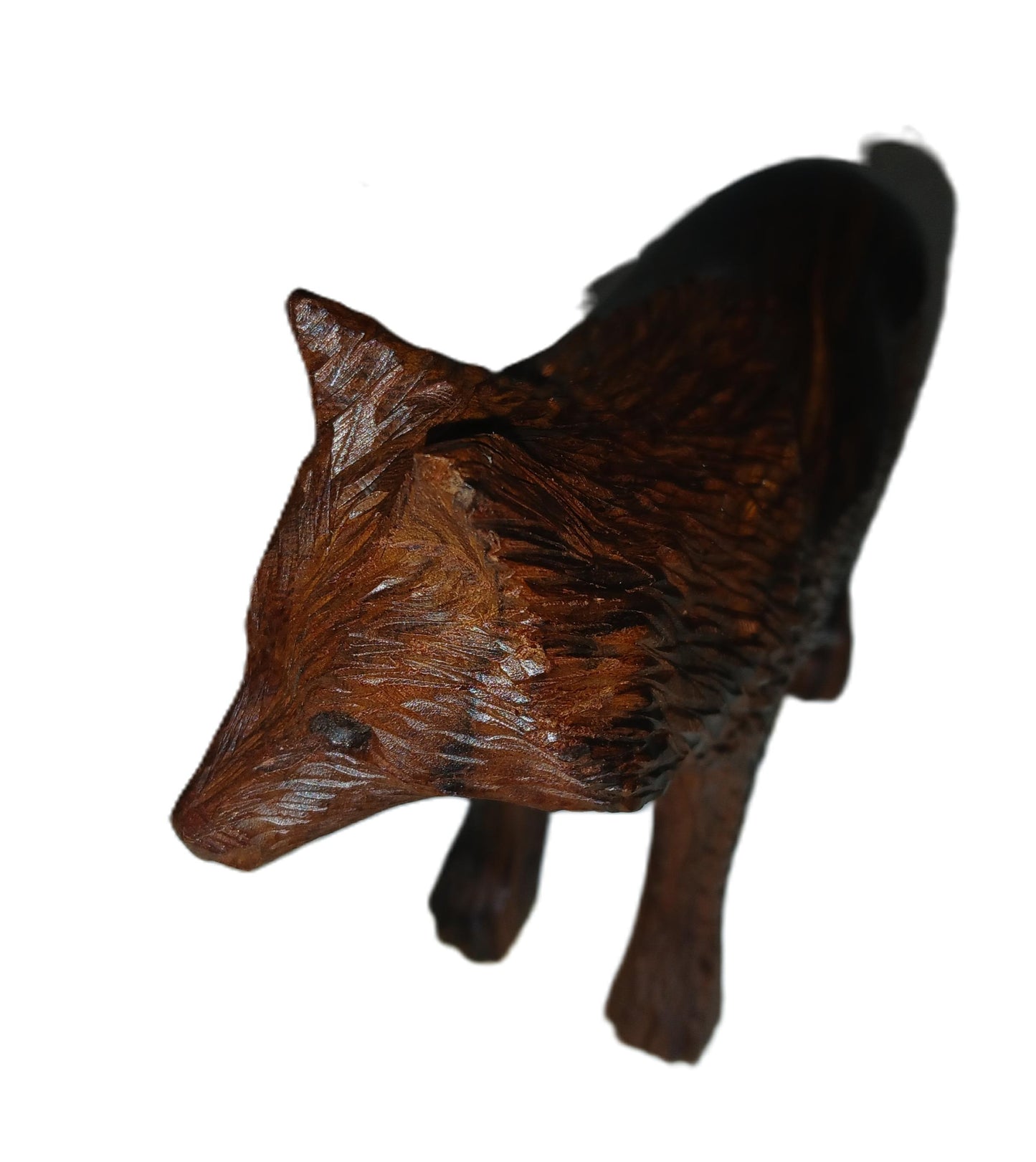 Wolf hand carved from ironwood.