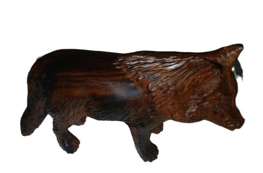 Wolf hand carved from ironwood.