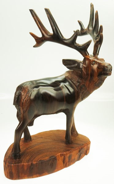 Elk on Base carved from Desert Ironwood