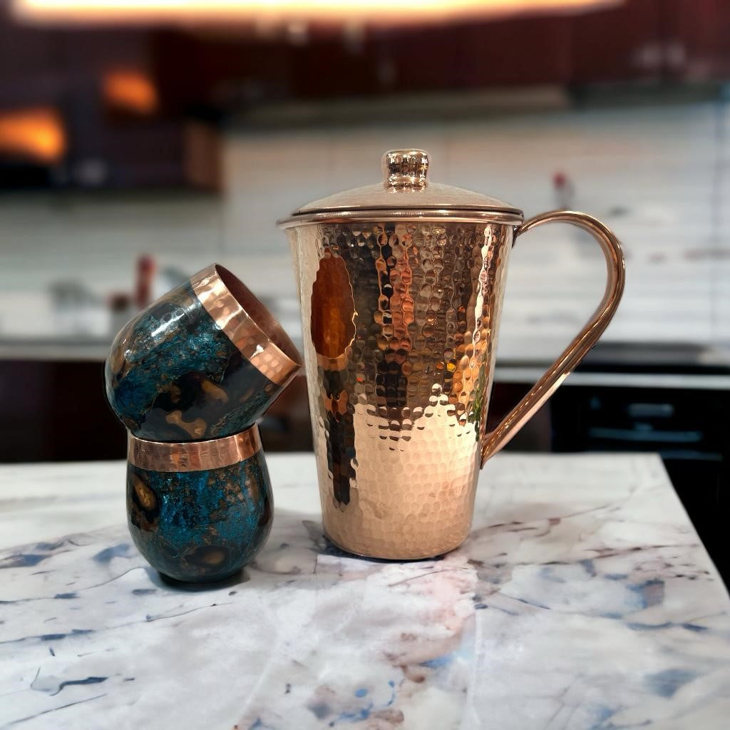 Set of One Shiny Hammered Copper Pitcher with Top and Two Blue Marbled Tumblers